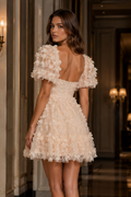 Golden A-line mini dress with a plunging V-neck and mirror decorations.